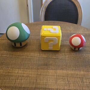 Green and Red Mushroom Figures with Yellow Question Block